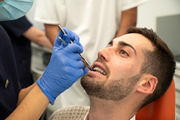 How A Prosthodontist Can Enhance Your Oral Health With A Smile Makeover